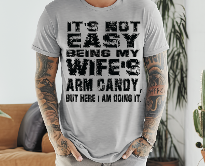 Not Easy Being Wife's Arm Candy